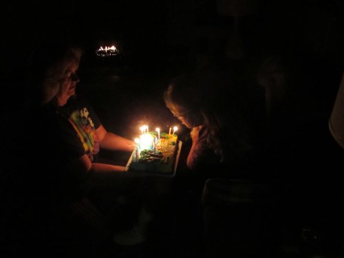 Melissa blowing out candles 