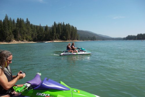 Missy, mom and dad on the lake 