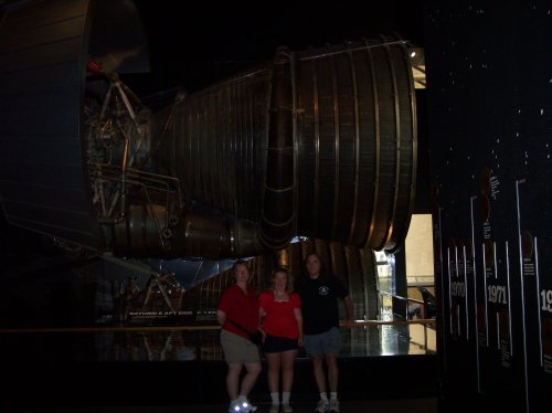 Mom, dad & Melissa in front of Saturn 5 rocket engine 