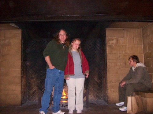 Jon, Melissa & Jonny in front of fireplace at the Ahwahnee 