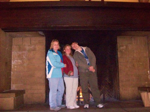 Lori, Melissa & Jonny in front of fireplace at the Ahwahnee 