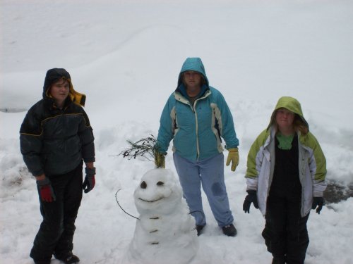 Jonny, Melissa, Mom & their snowman 