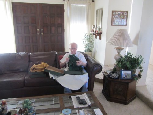 Grandpa opening Christmas presents 