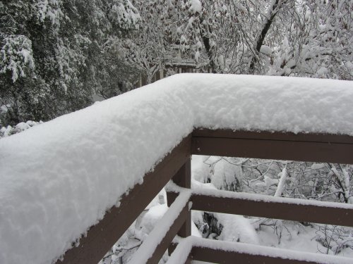 snow on railing 