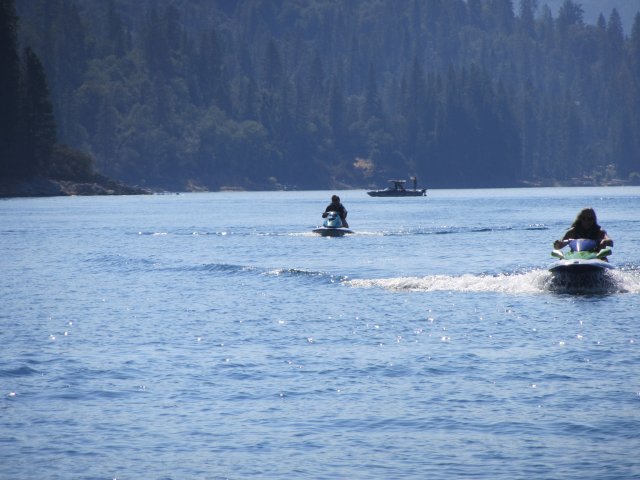 Family on watercraft at the lake